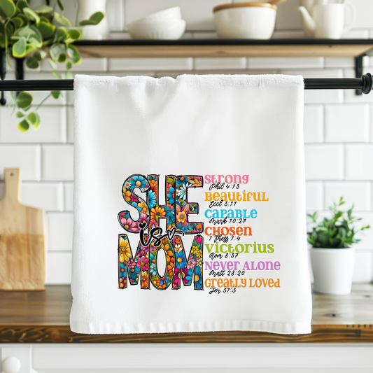 Kitchen towel with colorful text design on a kitchen counter