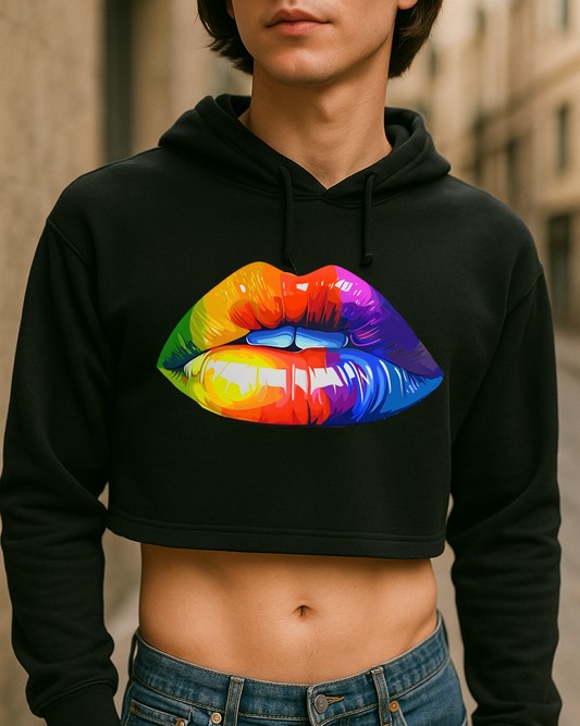 Person wearing a black hoodie with a colorful lips design outdoors.