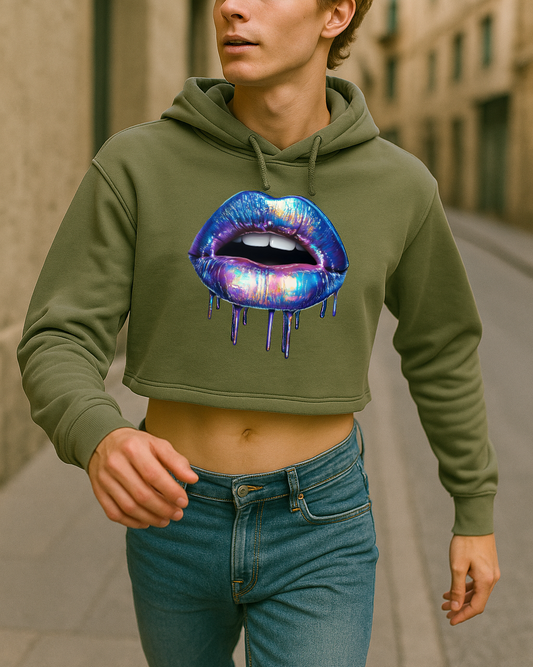 Person wearing a green hoodie with a colorful lip design in an urban setting
