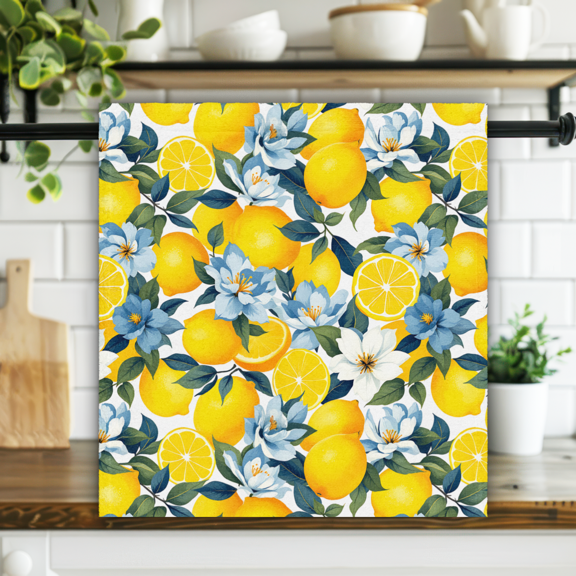 Floral towel with lemons hanging on a rack in a kitchen.